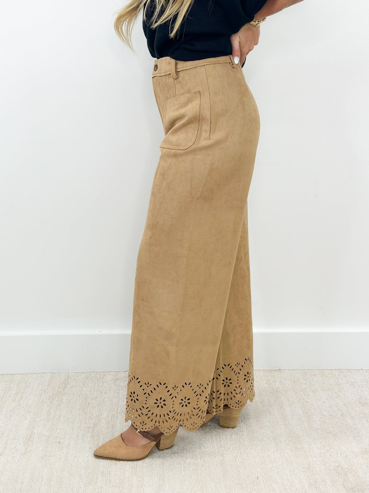 Wide leg suede pants with a cutout laser cut design
