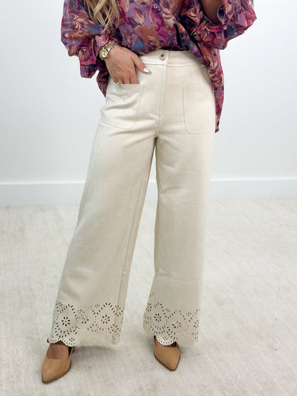 Suede wide leg pants with an openwork laser cut pattern