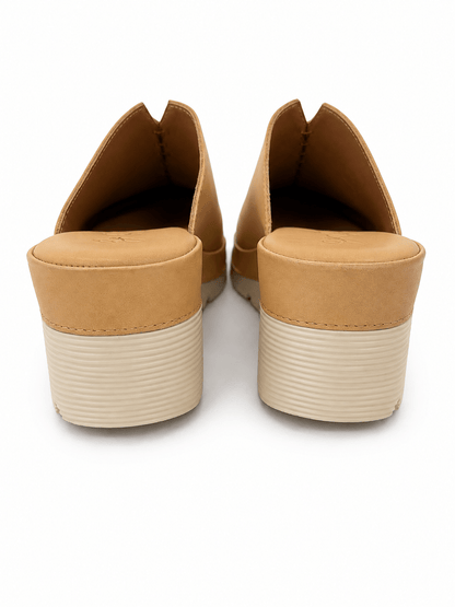 Platform leather mule with a braided vamp