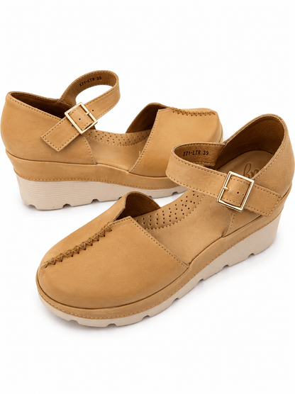 Leather ankle strap clog with a rounded toe