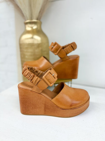 Taupe clog with a wooden wedge sole