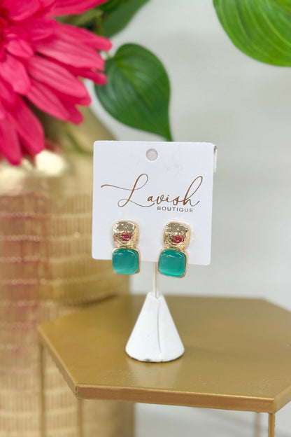 Bold aqua cat eye stone earrings with gold trim