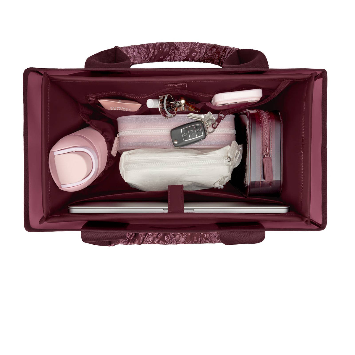 Burgundy tote organizer insert filled with small accessories in molded compartments