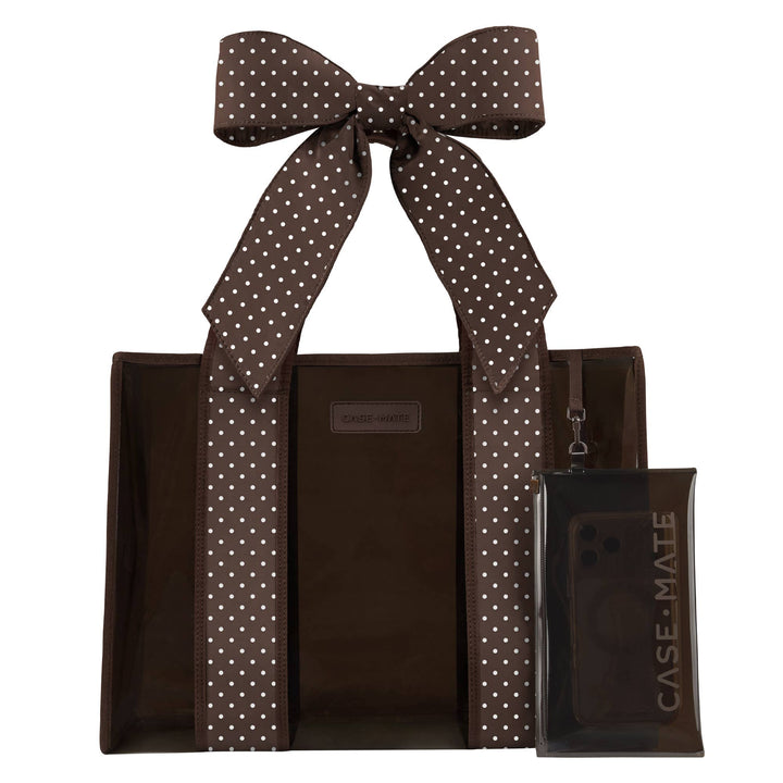 Espresso-brown jelly tote bag with white polka-dot ribbon bow and front zip pocket