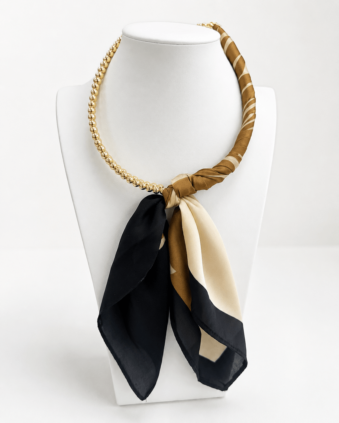 Long scarf necklace strung with round ball beads
