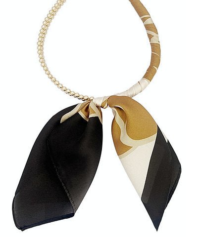 Scarf necklace of evenly spaced round beads