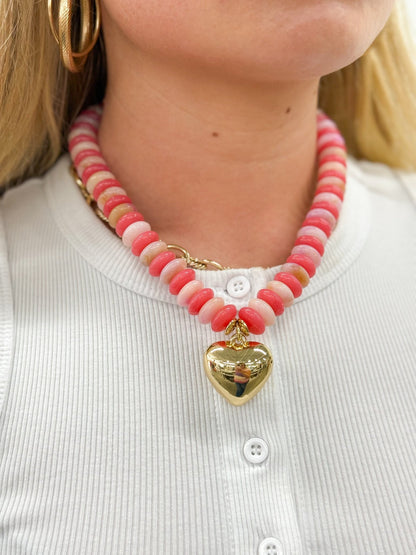 Coral and gold beaded heart charm necklace