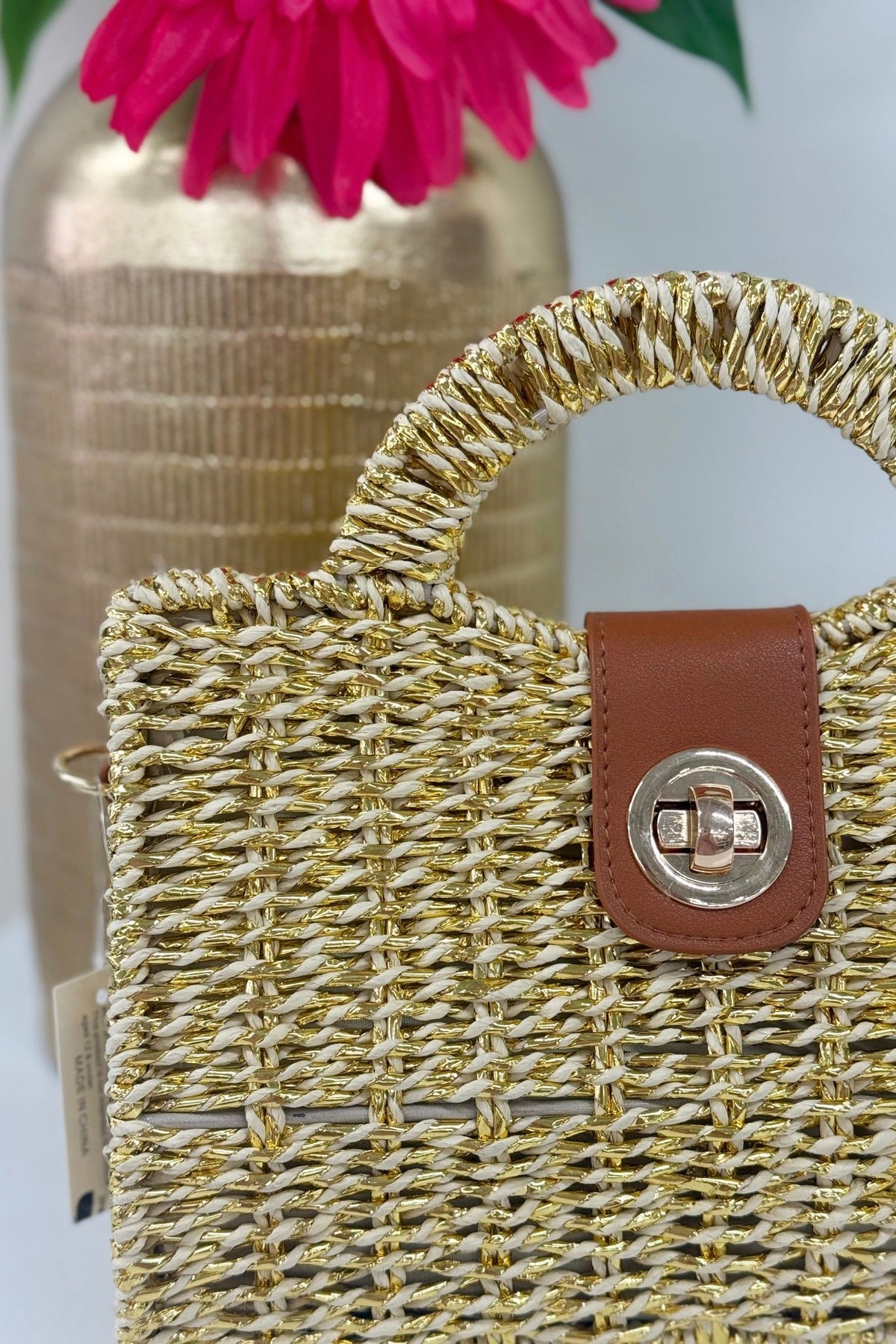 Basket weave beige handbag with a structured rectangular body