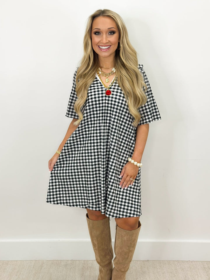 Black gingham dress with ruffle detailing