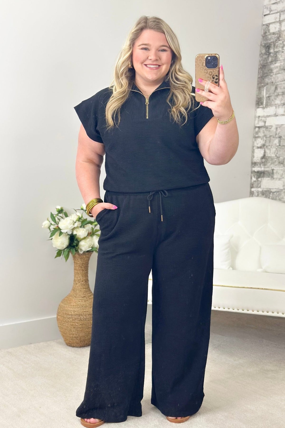 Black mock neck half zip and coordinating pants