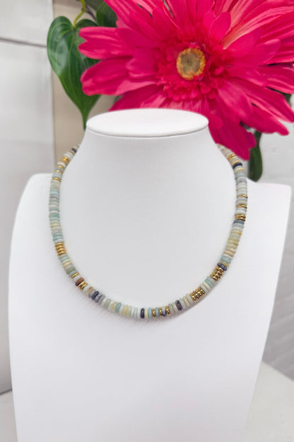Blue bead necklace with gold-tone accents