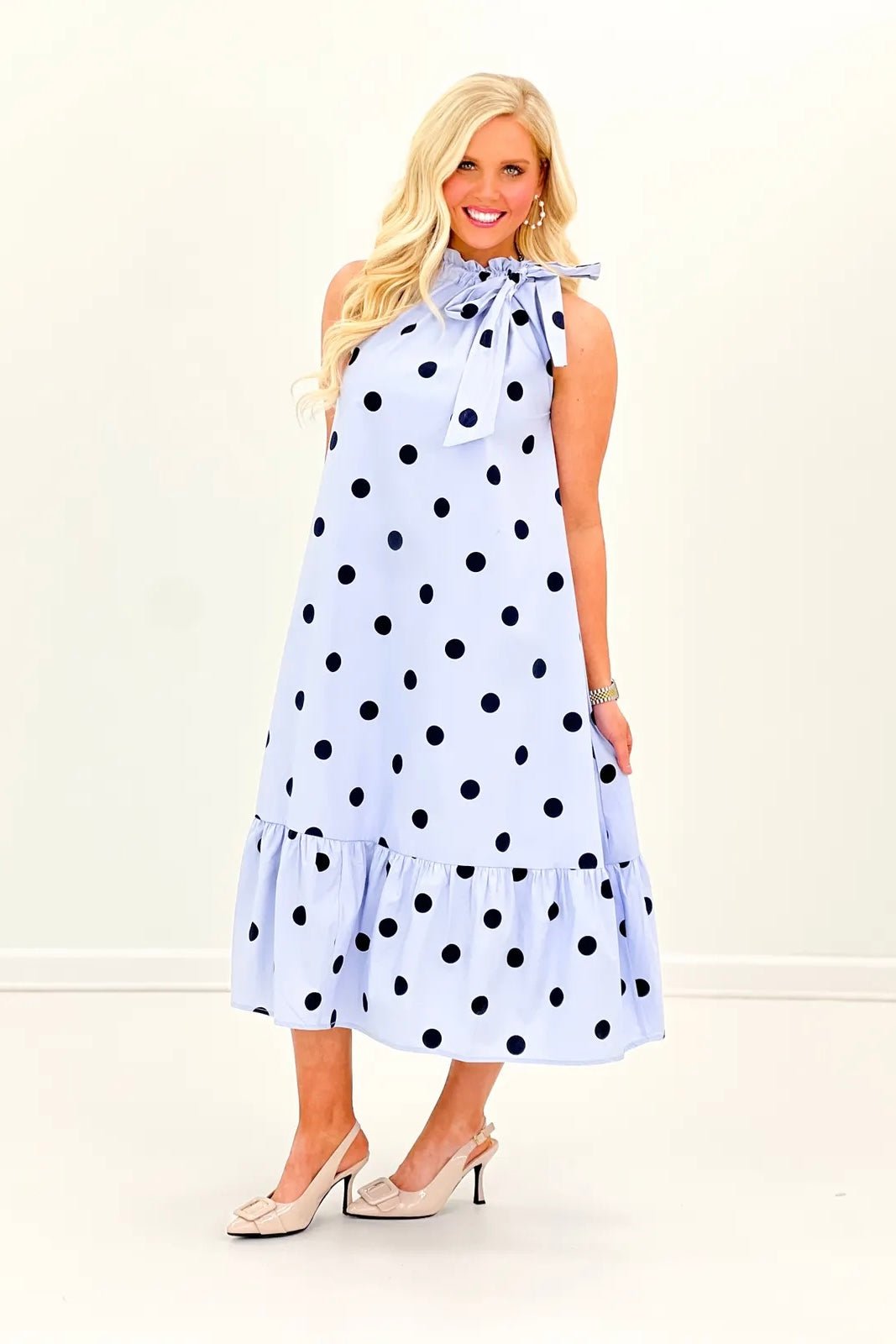 Ruffled tie neckline on a lined cotton midi dress