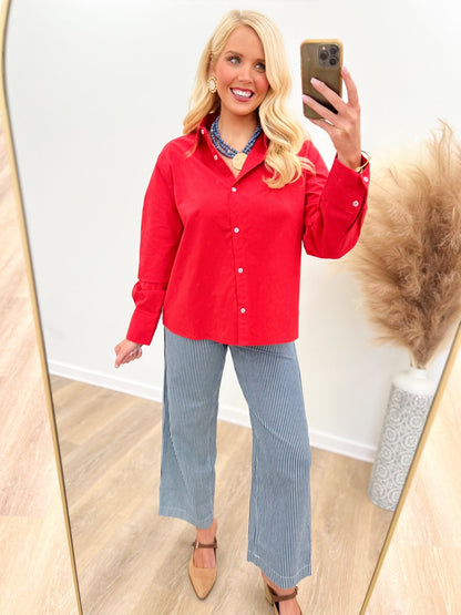 Collared button down top with long sleeves