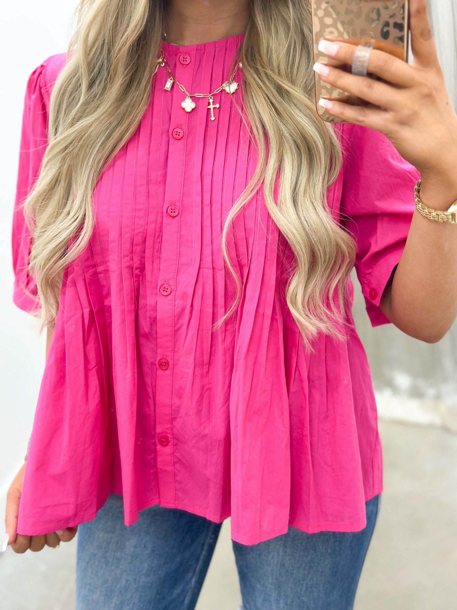 Pink puff sleeve shirt with pleating at the yoke