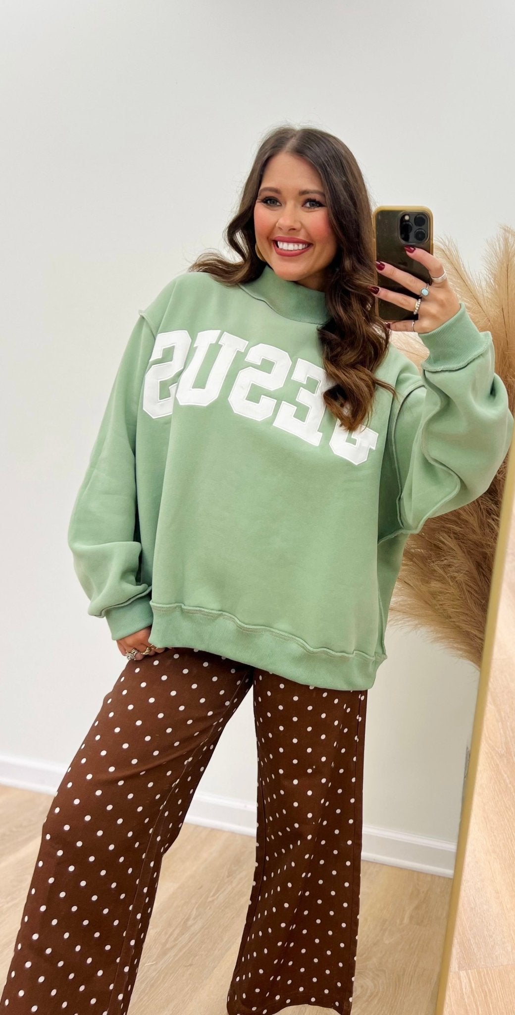 Mock neck sage sweatshirt with chest embroidery