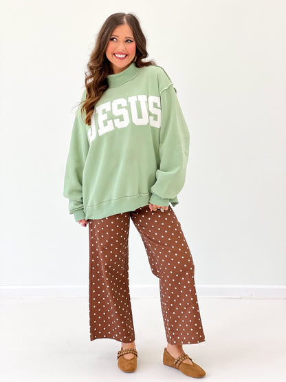 Sage green pullover sweatshirt with a high mock collar