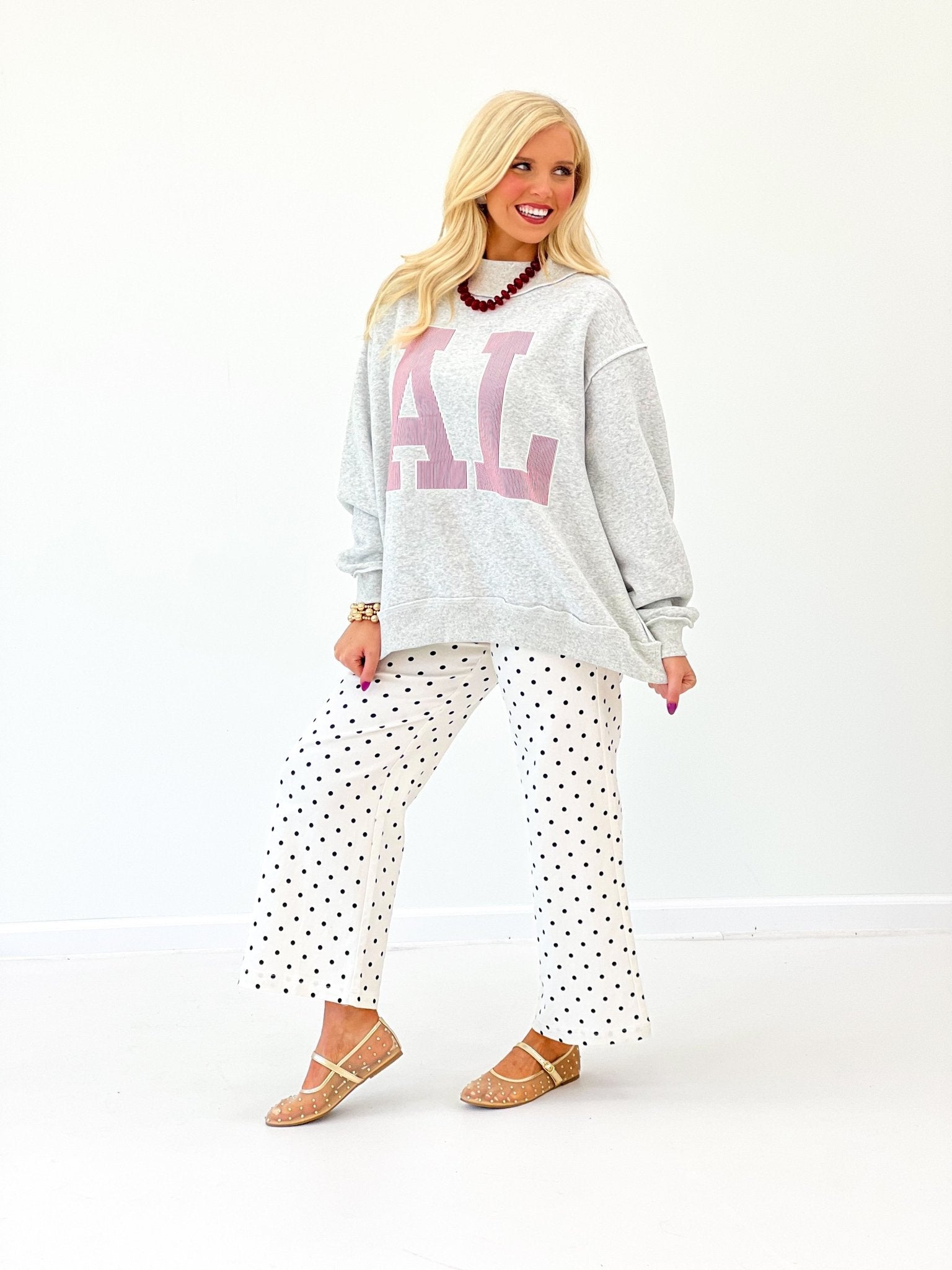 Grey sweatshirt with stitched collegiate lettering
