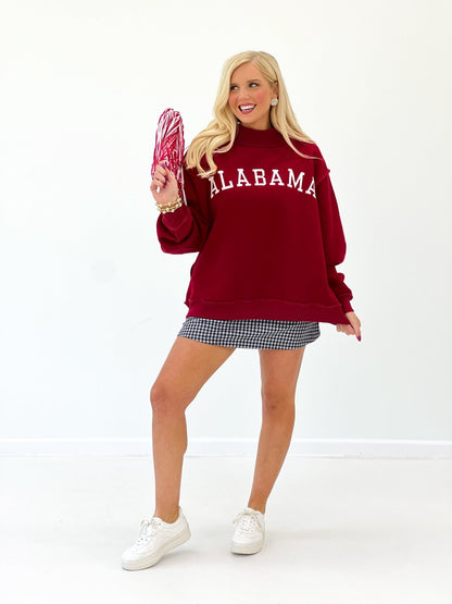 Crimson pullover sweatshirt with a high mock collar