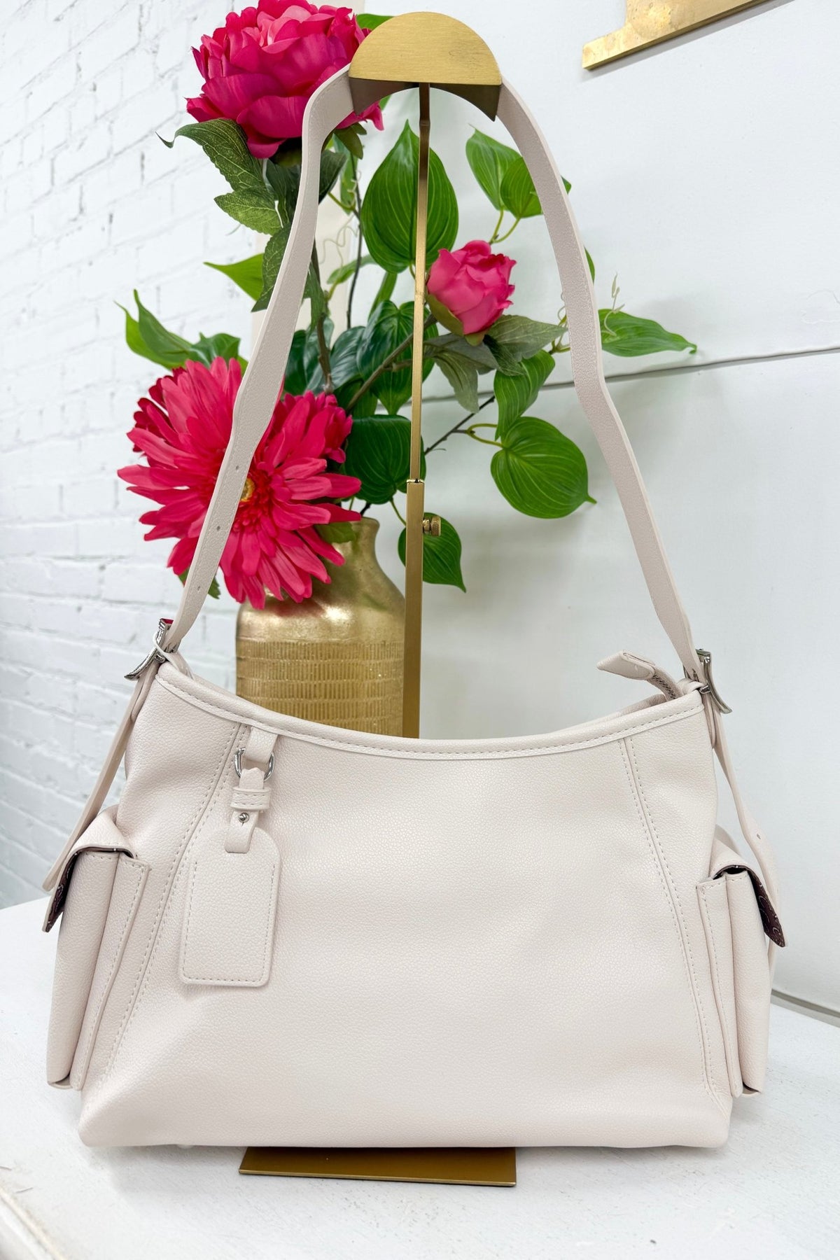 Buttermilk yellow cargo shoulder bag with a shoulder strap