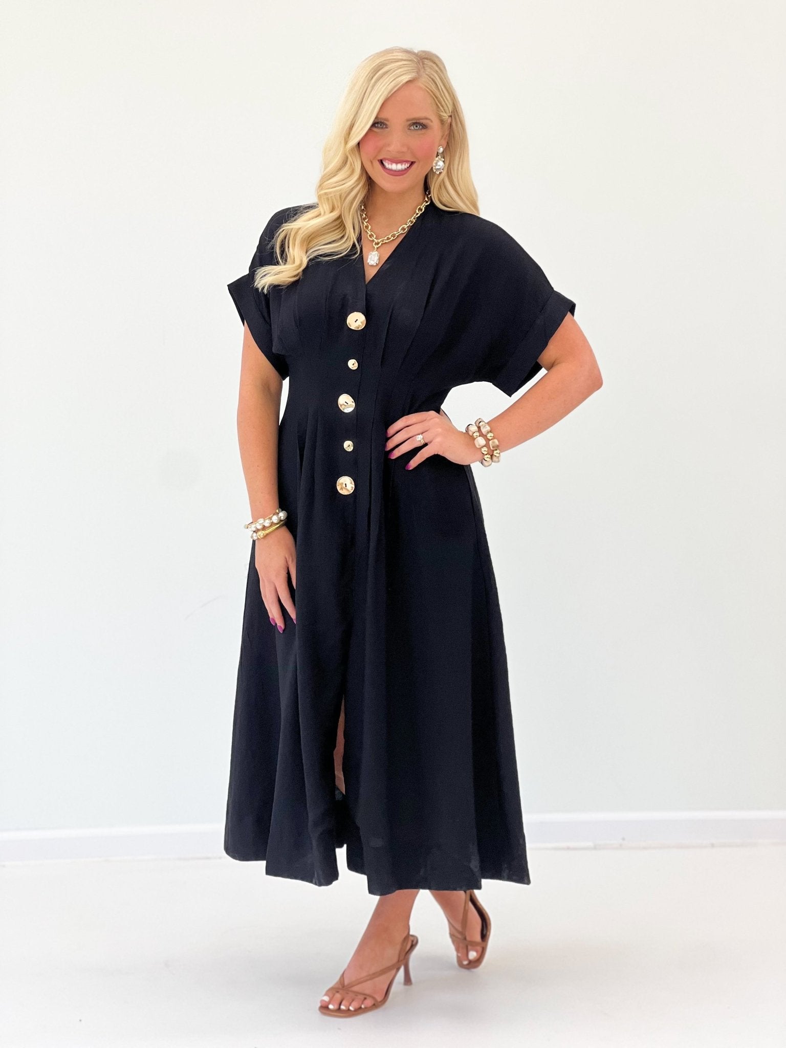 Pintuck detail on a black button front maxi dress