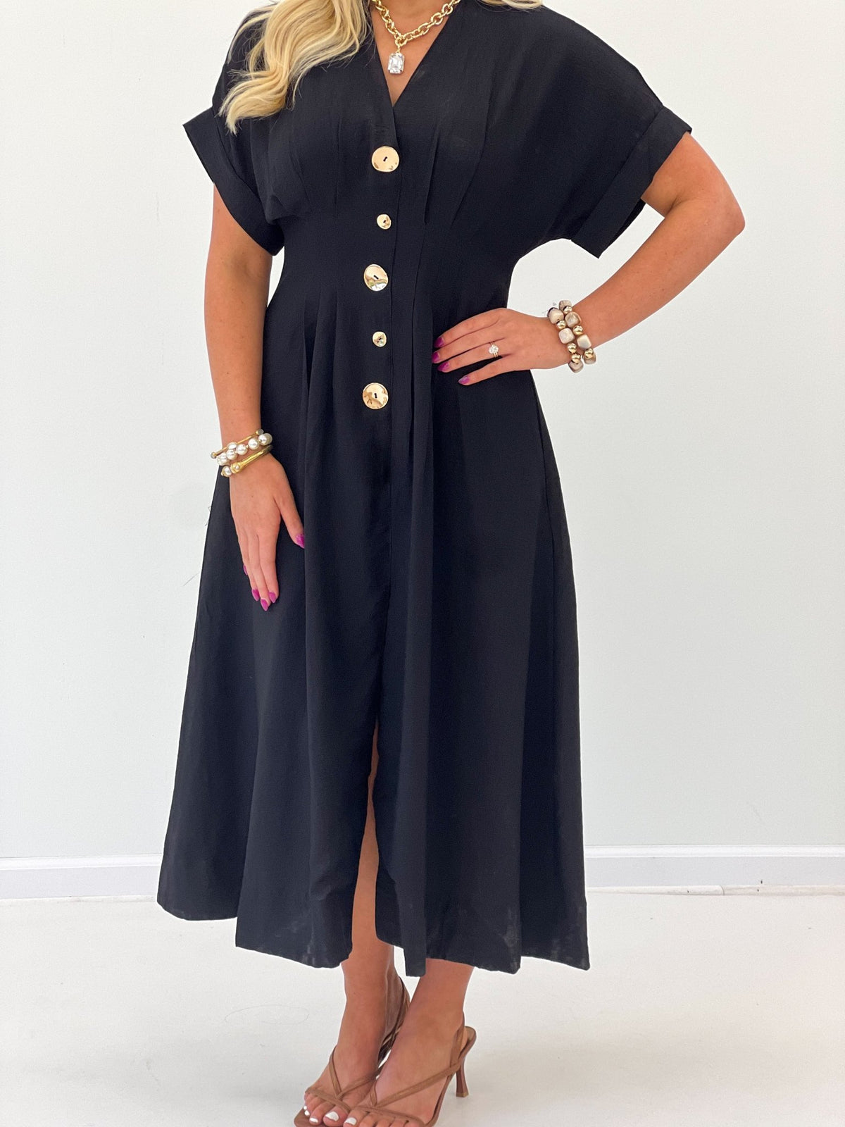 Black pintuck maxi dress with decorative buttons