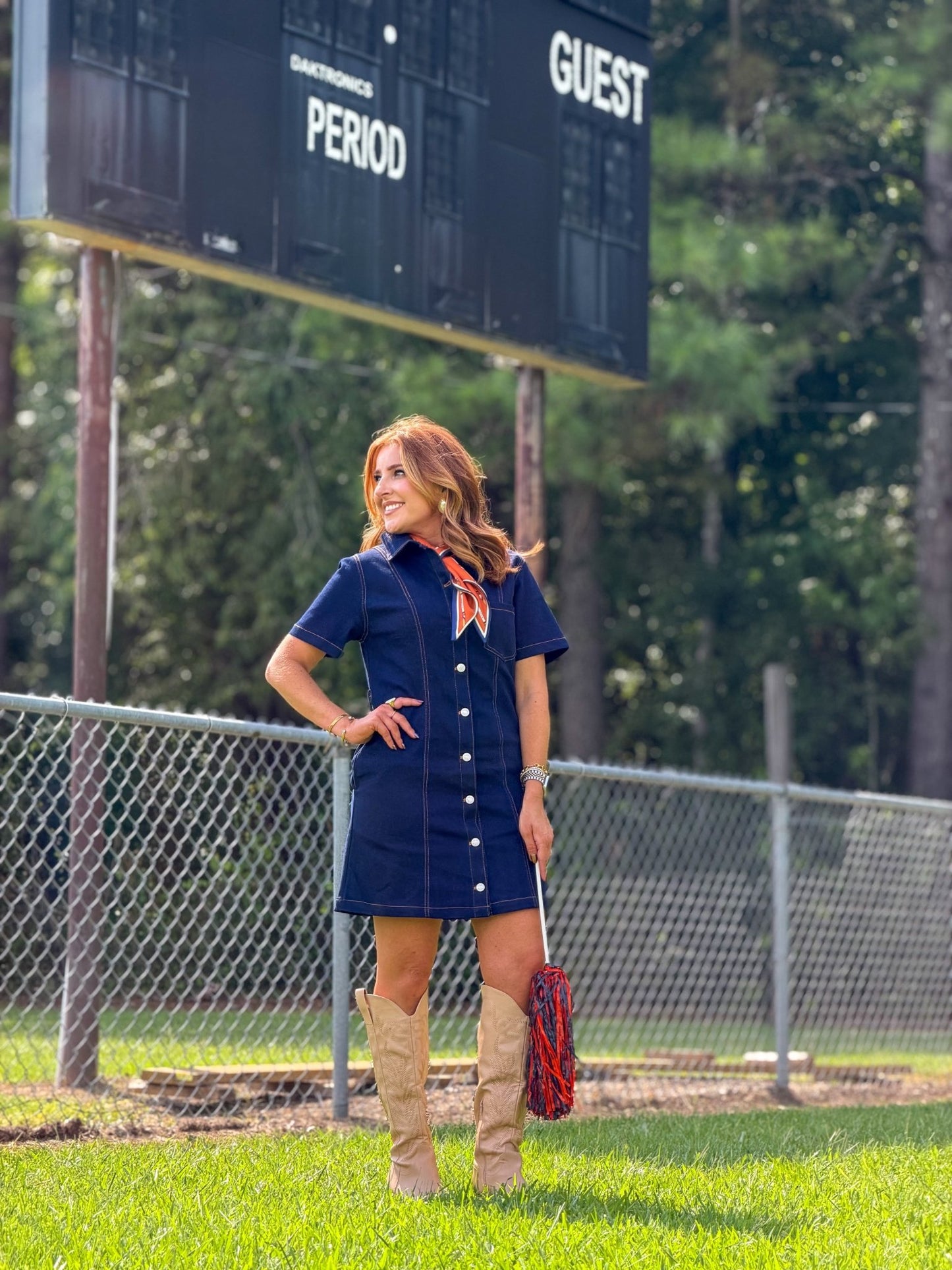 Button placket on a dark denim mini dress