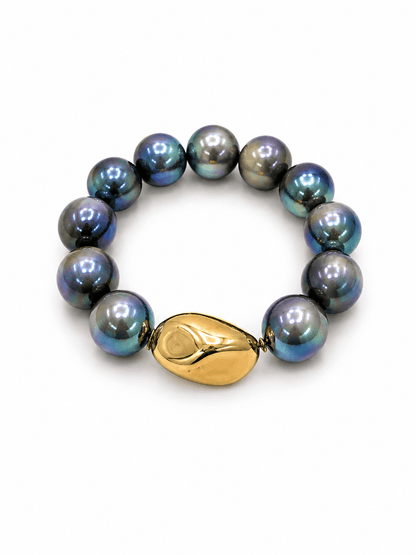 Glossy grey beads strung with gold beads on a bracelet