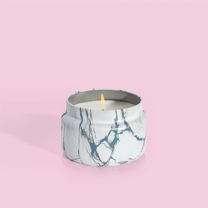 8.5oz marble tin candle in the Volcano fragrance