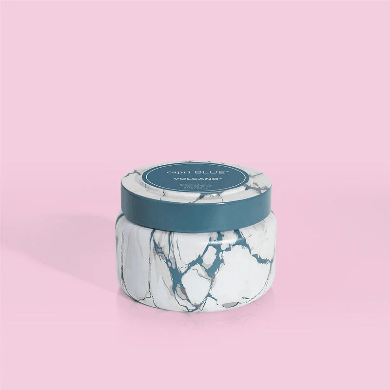 Volcano scented travel tin candle with a marble finish
