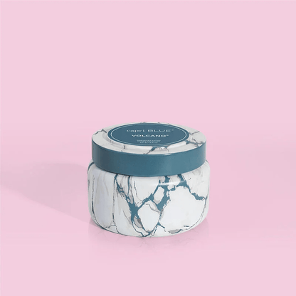 Volcano scented travel tin candle with a marble finish