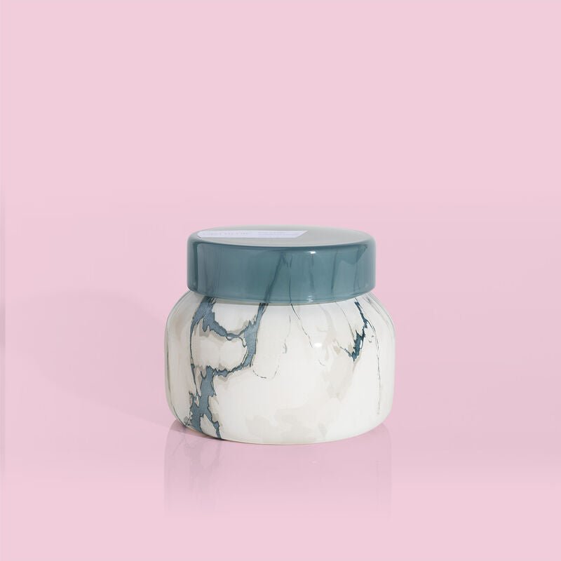Capri Blue Volcano candle in an 8oz modern marble petite jar
