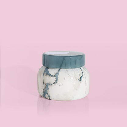 Capri Blue Volcano candle in an 8oz modern marble petite jar