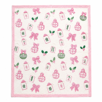 Thomas and Lee soft blanket close-up in pink and white with bows, candy, and bottle icons.