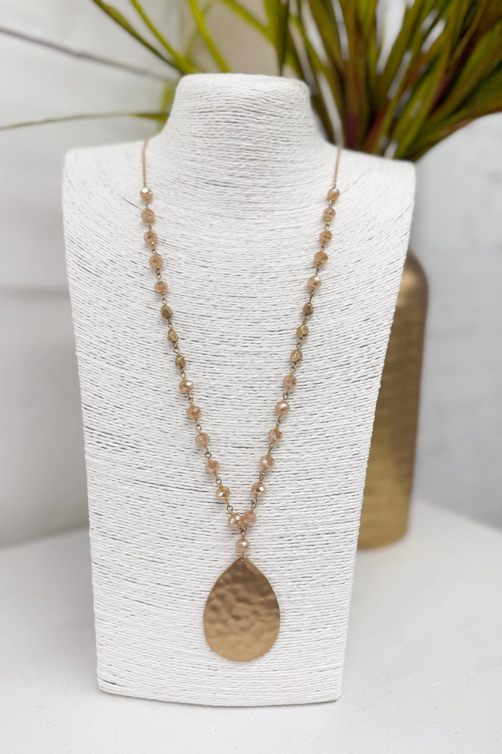 Champagne beaded necklace with a teardrop pendant
