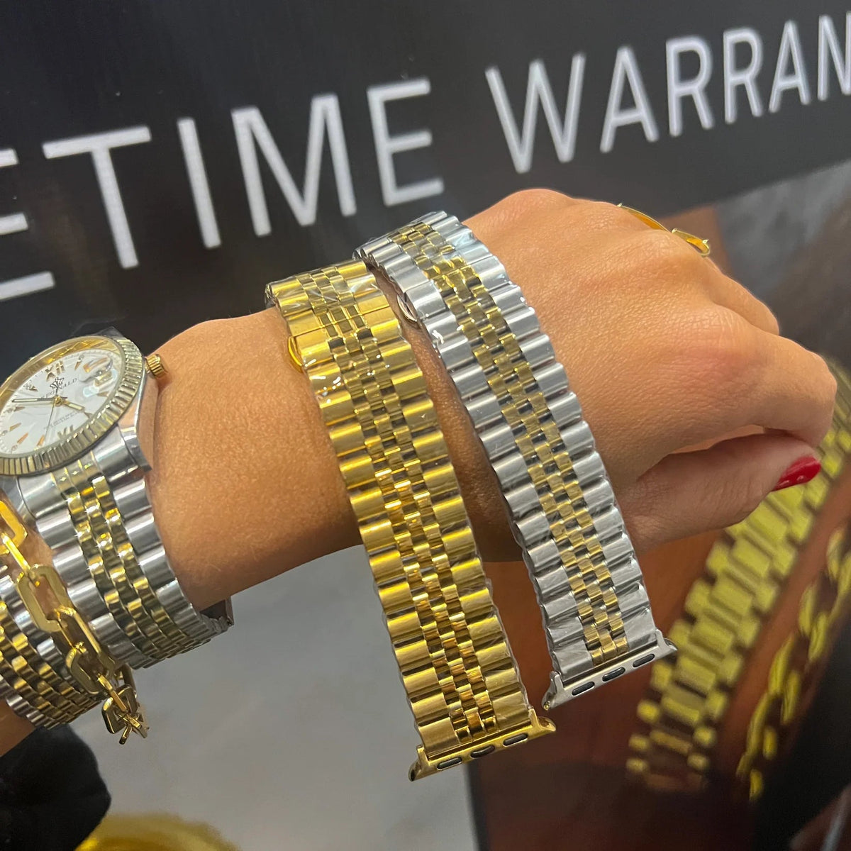 Gold metal Apple Watch band with linked segments