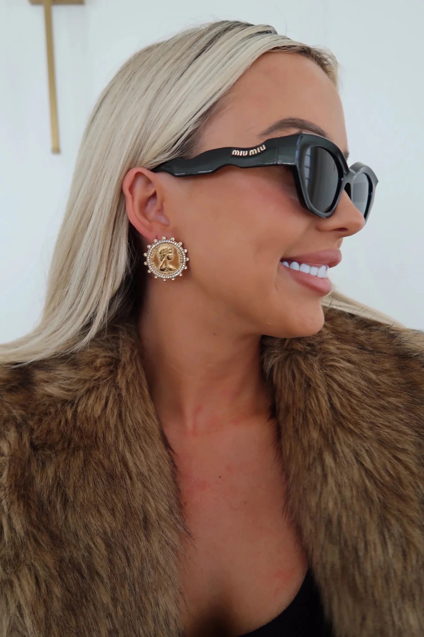 Gold medallion earrings with lettering
