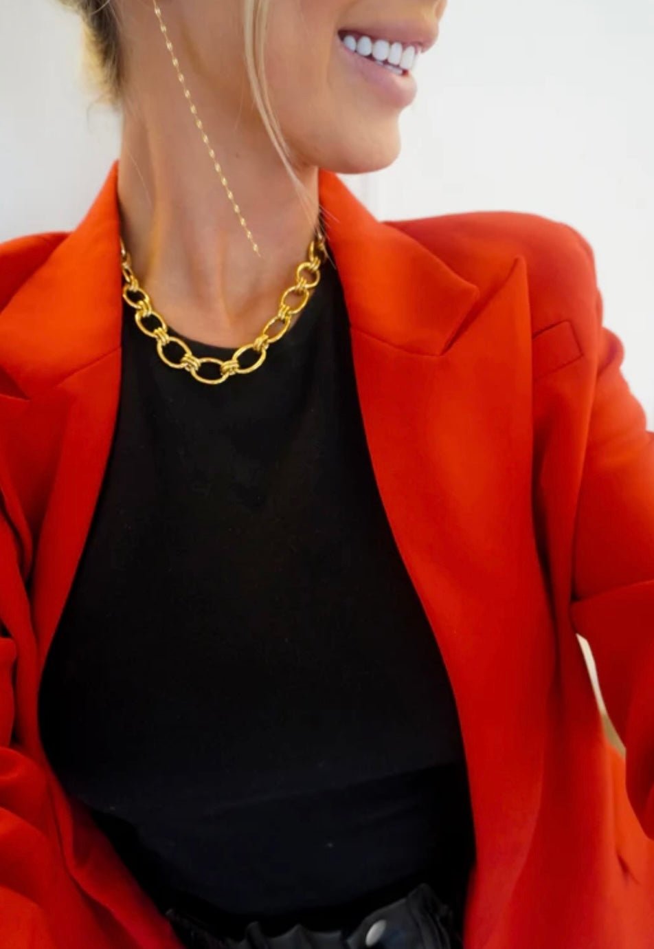Gold chain necklace with a line of sparkling stones
