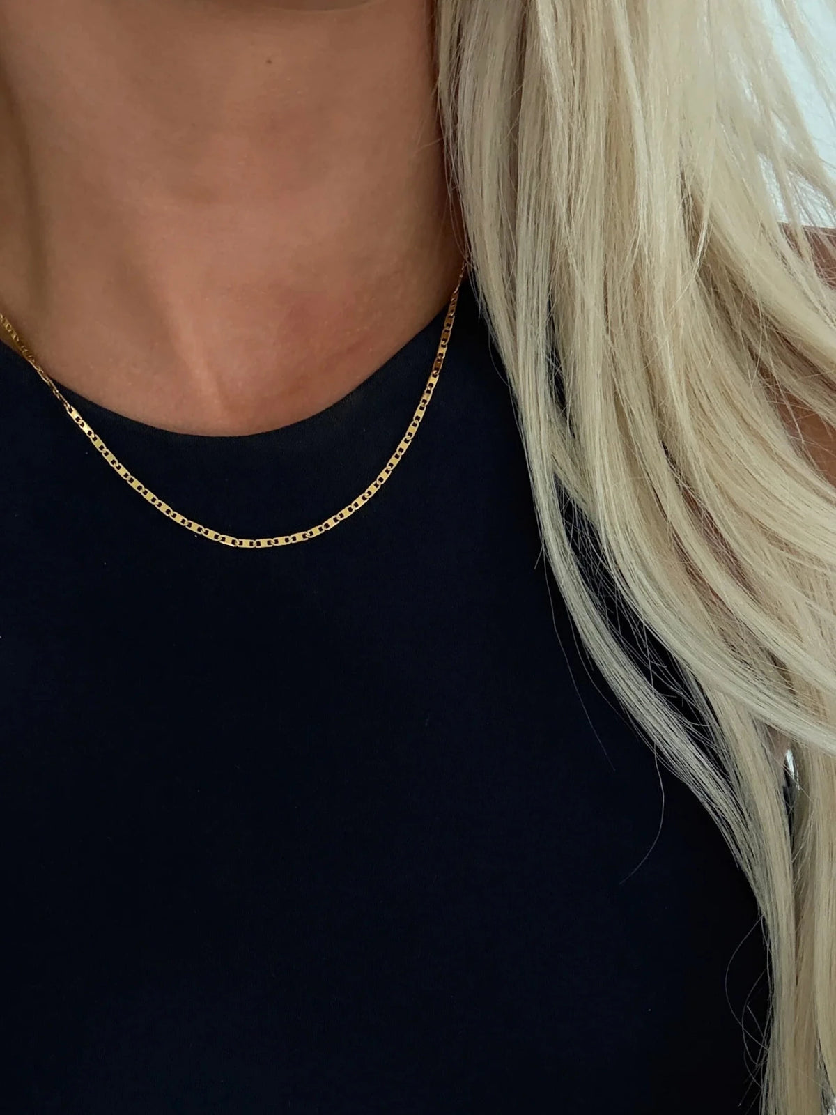 Gold necklace with a delicate pendant