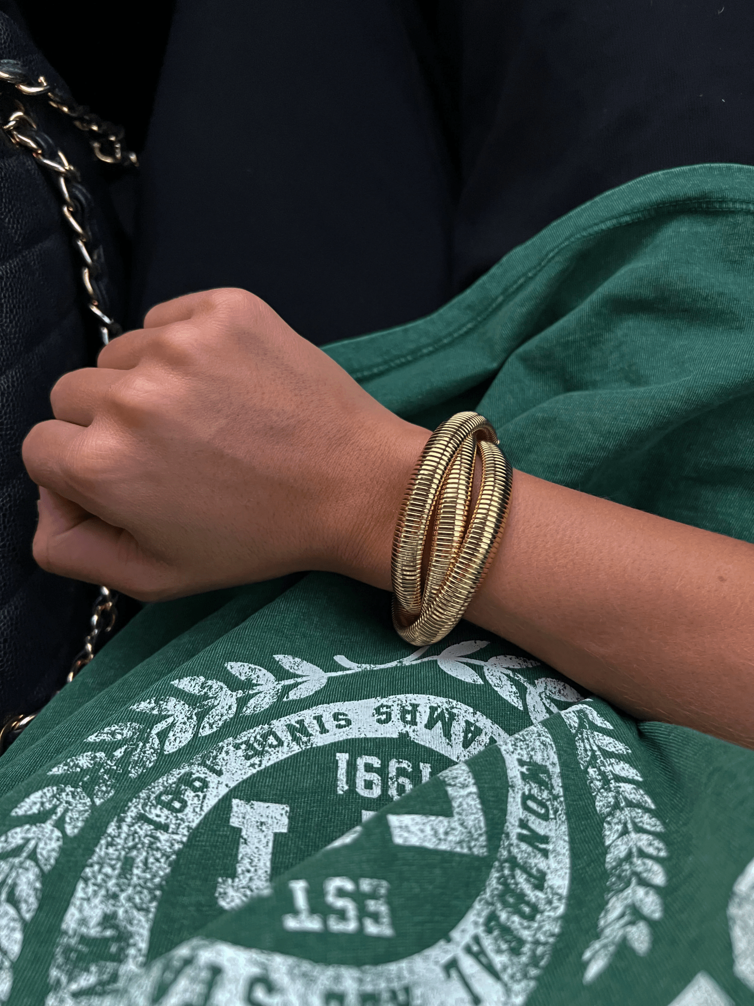 Layered gold bracelet with three bands