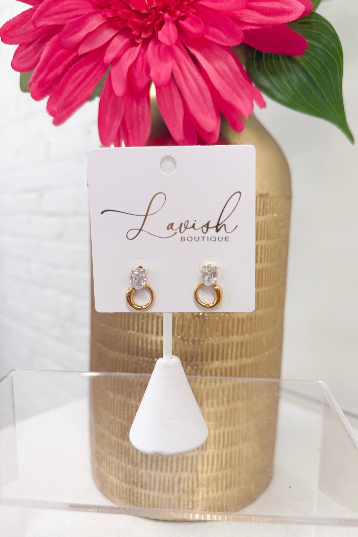 Round clear stone studs in a prong setting