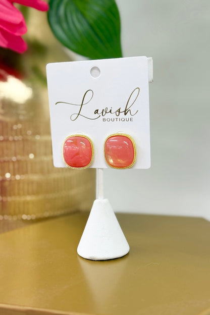 Squared coral marble stones set in gold