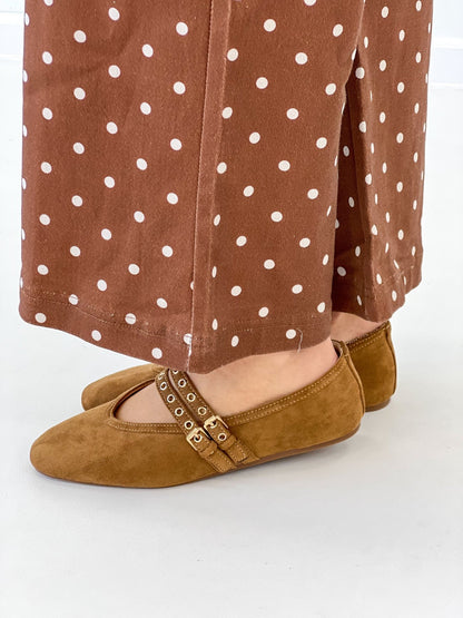 Camel faux suede Mary Jane flats with studded strap and buckle, side view, worn