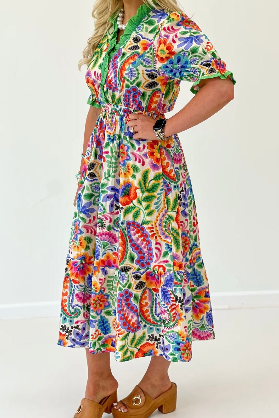 Cream floral midi dress with a feminine allover print