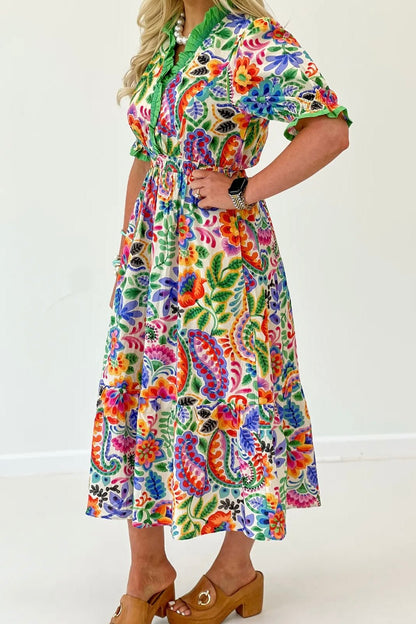Cream floral midi dress with a feminine allover print