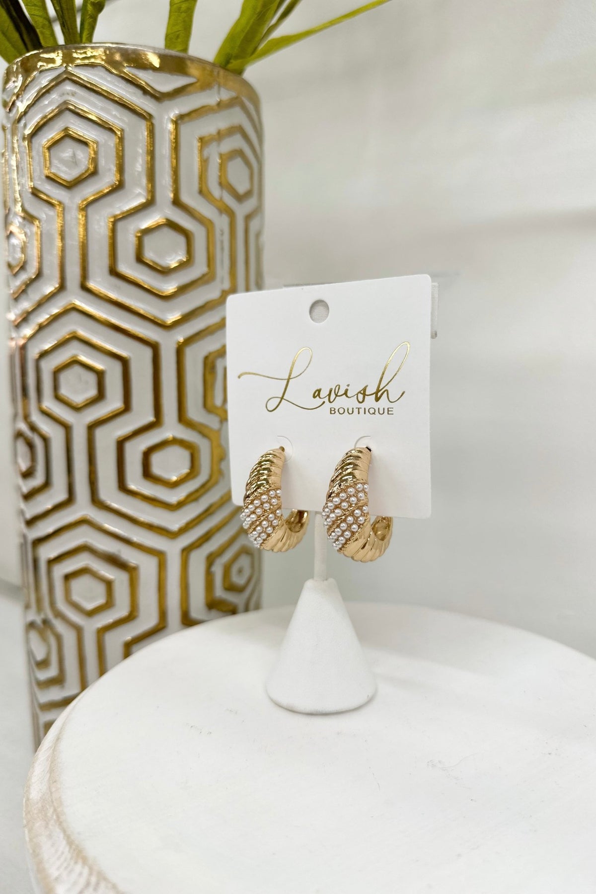 Cream and pearl crystal hoops with a textured finish