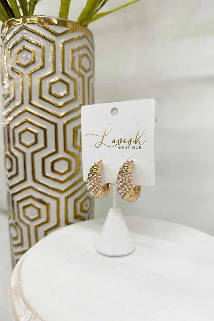 Cream and pearl crystal hoops with a textured finish