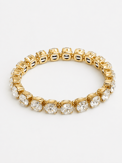 Clear crystal beads strung on a gold-tone bracelet