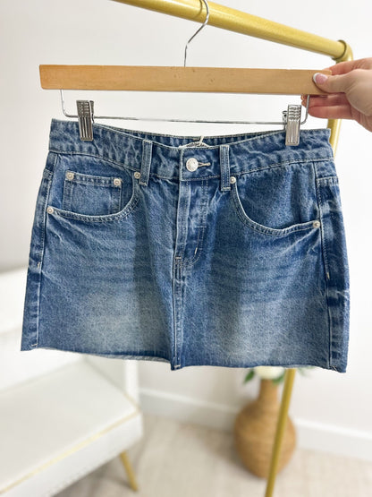 Raw hem denim skirt with a fitted waist