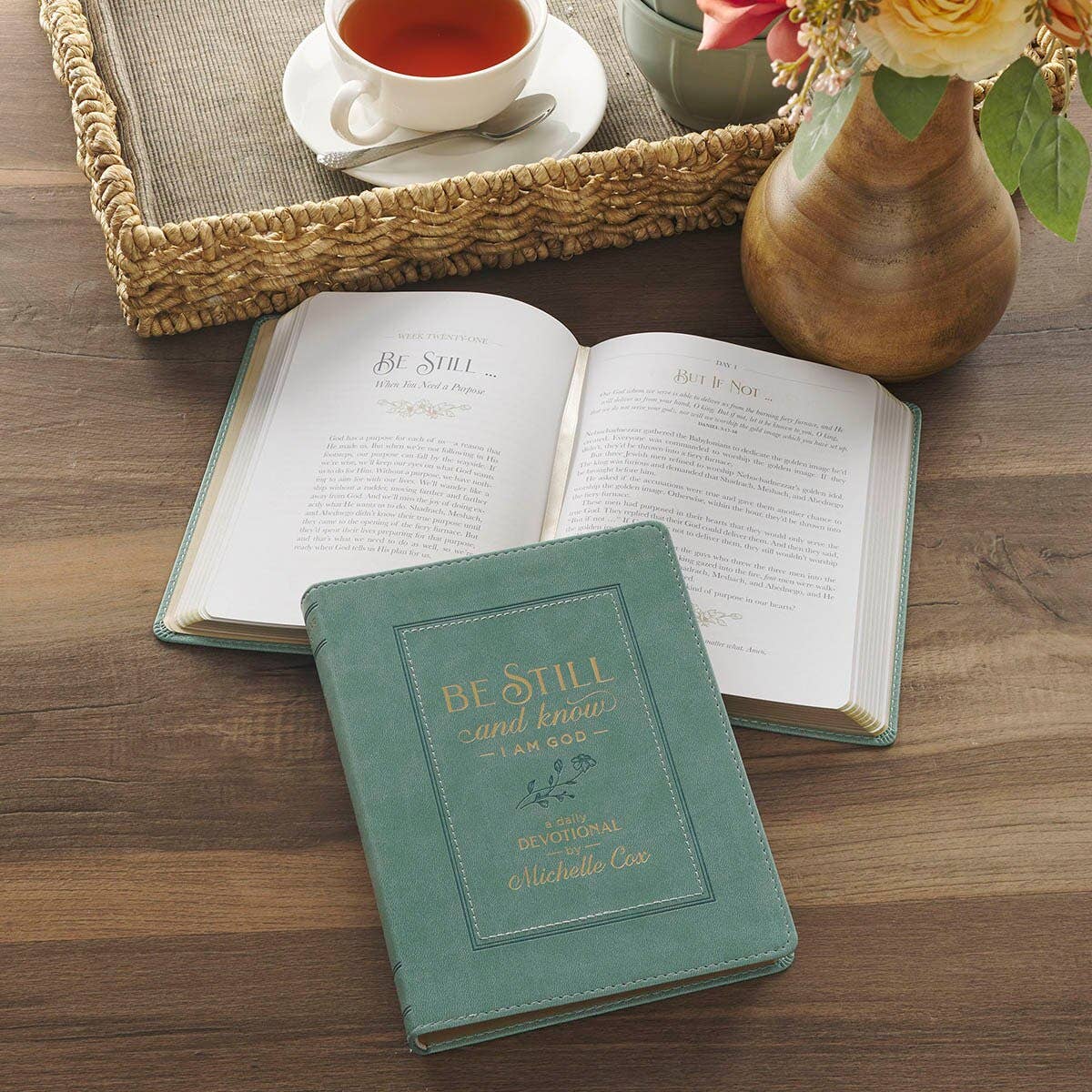 Teal devotional book with a soft faux leather cover