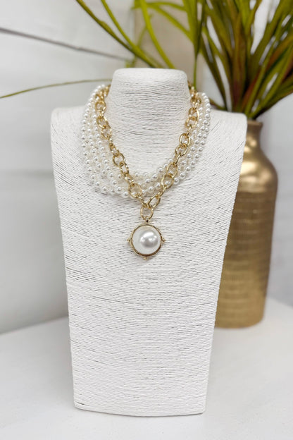Cream pearl layered necklace with domed pearls